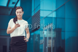 Fototapety Successful businessman talking on cellphone.
