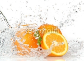 Orange fruits with Splashing water