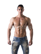 Naklejki Frontal shot of shirtless muscular young man in jeans