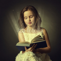 Naklejki Teen girl reading the Book.