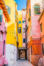 Naklejki Colorful houses of residential street in Venice, Italy