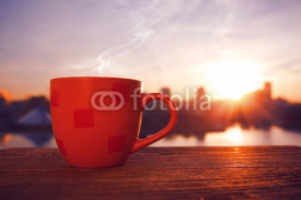 Naklejki morning coffee with city view in sunrise