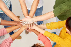 group of international people with hands together