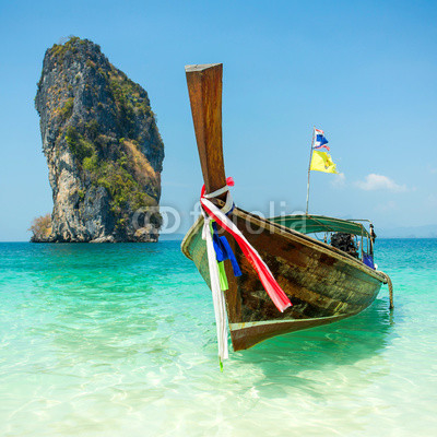 Longtail boat at the tropical beach of Poda island, Andaman sea,