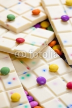 Fototapety still life of white chocolate with smarties