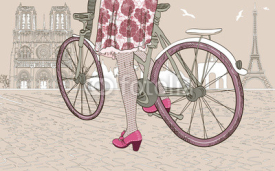 Naklejki woman riding a bicycle in Paris
