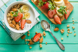 Obrazy i plakaty Breakfast - strawberry and banana muesli with yogurt