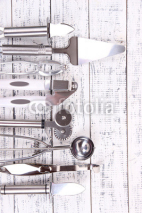Naklejki Metal kitchen utensils on table close-up