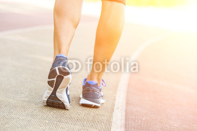 Woman Ready to Run on Track Lane