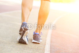 Fototapety Woman Ready to Run on Track Lane