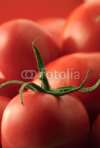 Obrazy i plakaty Ripe red tomatoes close up, full frame