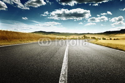 asphalt road in Tuscany, Italy
