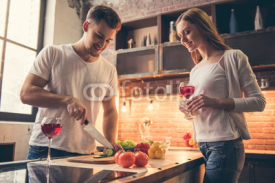 Beautiful couple cooking