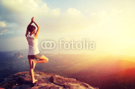 Naklejki yoga woman meditation on mountain peak  