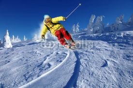 Fototapety Skier skiing downhill in mountains