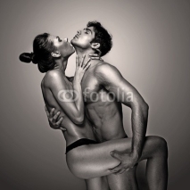 Fototapety Passionate Naked Couple In Suggestive Pose