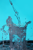 Naklejki Liquid pouring into the glass