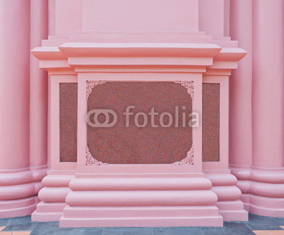 The pink marble plate on the pink wall