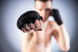 Naklejki Boxing. Fighter's fist close-up