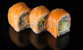 Naklejki sushi over black background