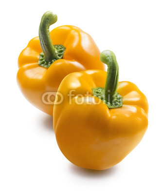 Two yellow bell pepper isolated on white background