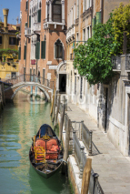 Naklejki Ponte del diabolo and a canal with gondola, Venice, Italy