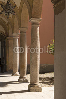 old stone columns in courtyard, Volpedo, Italy