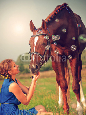 young beautiful  girl  with her horse