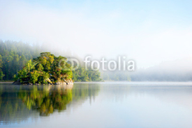 Fototapety Island on foggy morning
