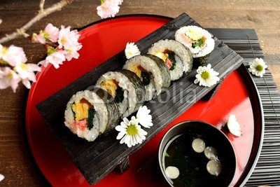 Sushi roll on Japanese red tray