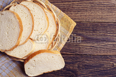 Slices white bread in plate