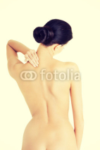 Fototapety Young woman with pain in her back.