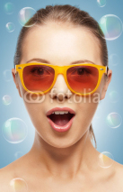 Naklejki surprised teenage girl in shades