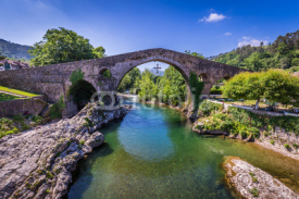 Naklejki Old Roman stone bridge in Cangas de Onis (Asturias), Spain