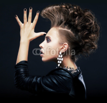 Naklejki Beauty woman with pigtails, creative hairstyle, saluting