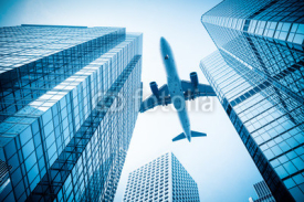 Fototapety airplane and modern office building