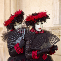 Naklejki Venetian costume attends Carnival of Venice.