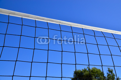 Net for beach volleyball against the blue sky