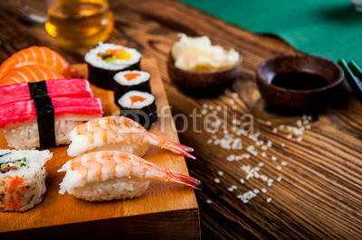 Wonderful sushi set, oriental theme on the old wooden table