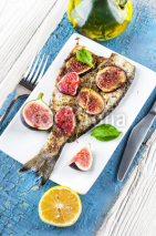 Fototapety Dorado fish with lemon and figs, Mediterranean cuisine