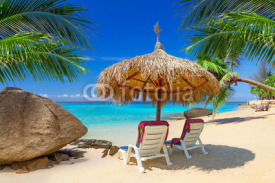 Fototapety Tropical beach scenery with deck chairs in Thailand