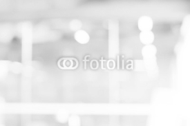 abstract white and gray bokeh lights background with motion blur