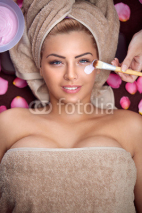Woman with clay facial mask