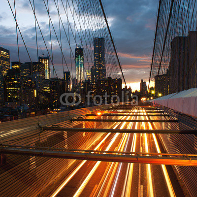 Manhattan skyline from the Brooklyn bridge at dusk 