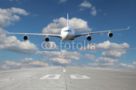 Fototapety Low pass of white plane