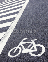 Naklejki Bicycle lane signage on the street