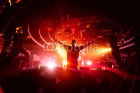 Fototapety DJ hands up in night club party background
