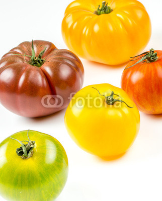 Many varieties of colorful tomatos