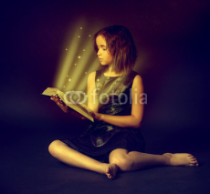 Naklejki Teen girl reading the Book. Education