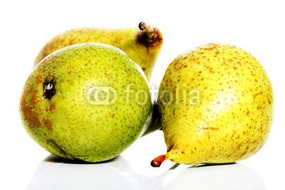 Three fresh pears over white.